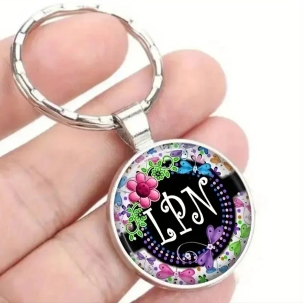 LPN keychain silver round flowers butterfly Nurse‎